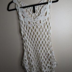 Beautiful cream knitted top hangs a little long